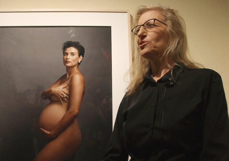 BERLIN - FEBRUARY 20:  Photographer Annie Leibovitz speaks to the media while standing in front of a portrait of pregnant actress Demi Moore during a walk-through of the exhibition "Annie Leibovitz - A Photographer's Life 1990-2005" at the C/O Gallery on February 20, 2009 in Berlin, Germany. The exhibition is open to the public from February 21 until May 24.