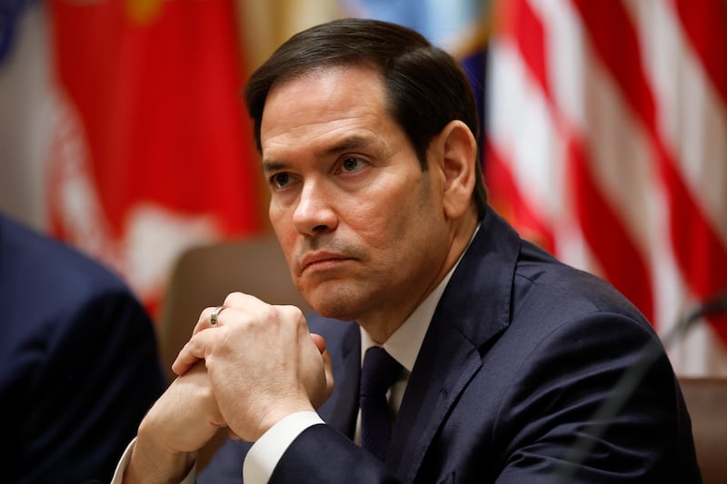 Secretary of State Marco Rubio looks on during a meeting with U.S. President Donald Trump and President of Argentina