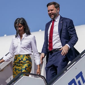 US Vice President JD Vance (R) and Second Lady Usha Vance disembark from their plane upon arriving at Ben Gurion Airport in Tel Aviv on October 21, 2025. The US president warned Hamas it will be wiped out if it breaches the Gaza ceasefire, as Vice President JD Vance travelled to Israel on October 21 to shore up the fragile truce. (Photo by Nathan HOWARD / POOL / AFP) (Photo by NATHAN HOWARD/POOL/AFP via Getty Images)