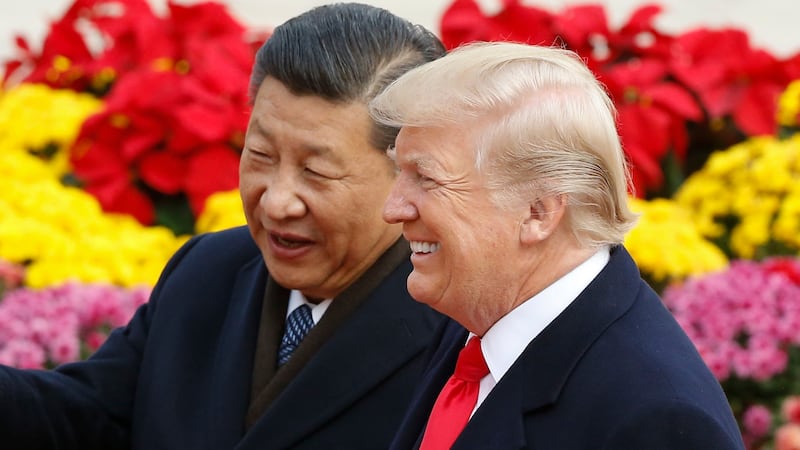 Chinese President Xi Jinping and U.S. President Donald Trump attend a welcoming ceremony November 9, 2017 in Beijing, China.