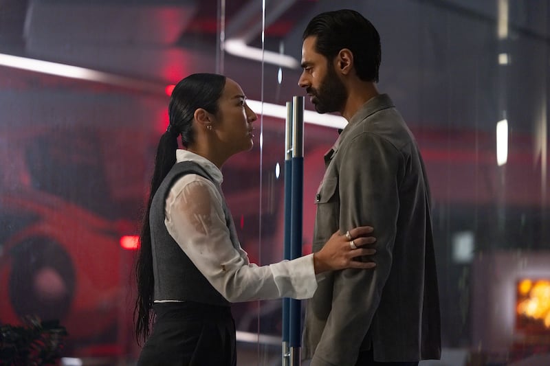 Greta Lee as Eve Kim and Hasan Minhaj as Ajay Singh in Tron: Ares.