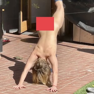 In his congratulatory Instagram post, Shepard, 50, celebrated the nod by posting an image of Bell in a downward dog yoga pose, wearing only knee-high socks.