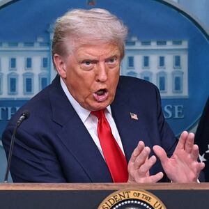 President Donald Trump, pictured Aug. 11, threatened Federal Reserve Chair Jerome Powell with a "lawsuit" over the cost of the Fed renovations the same day the latest CPI showed core inflation ticking up.