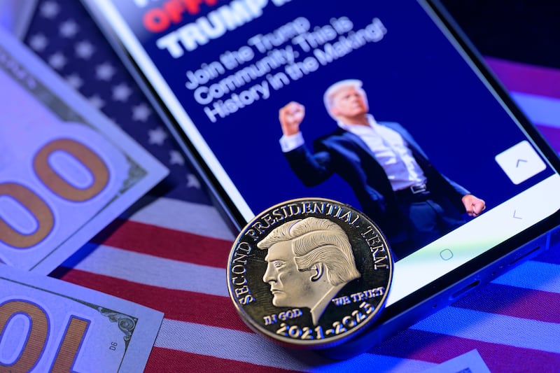 This photo illustration shows the representation of the $Trump meme coin in Brussels, Belgium, on February 13, 2025.