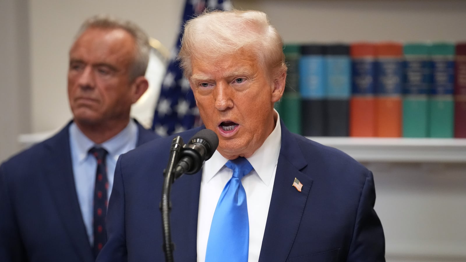 WASHINGTON, DC - SEPTEMBER 22: U.S. President Donald Trump answers questions after making an announcement on “significant medical and scientific findings for America’s children” in the Roosevelt Room of the White House on September 22, 2025 in Washington, DC. Federal health officials suggested a link between the use of acetaminophen during pregnancy as a risk for autism, although many health agencies have noted inconclusive results in the research. (Photo by Andrew Harnik/Getty Images)