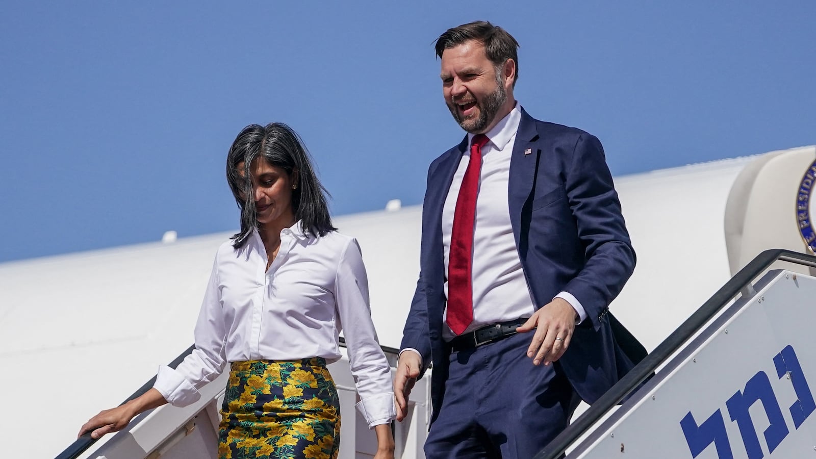 US Vice President JD Vance (R) and Second Lady Usha Vance disembark from their plane upon arriving at Ben Gurion Airport in Tel Aviv on October 21, 2025. The US president warned Hamas it will be wiped out if it breaches the Gaza ceasefire, as Vice President JD Vance travelled to Israel on October 21 to shore up the fragile truce. (Photo by Nathan HOWARD / POOL / AFP) (Photo by NATHAN HOWARD/POOL/AFP via Getty Images)