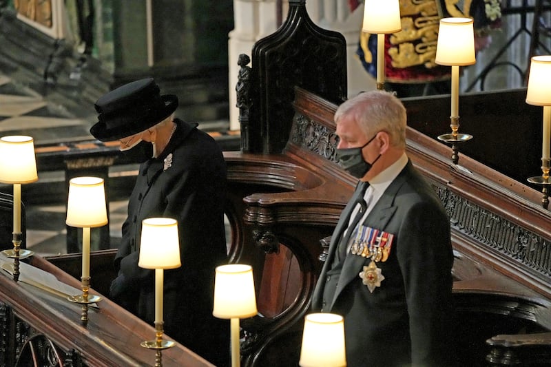 WINDSOR, ENGLAND - APRIL 17: Queen Elizabeth II and Prince Andrew, Duke of York attend the funeral of Prince Philip, Duke of Edinburgh at Windsor Castle on April 17, 2021 in Windsor, England. Prince Philip of Greece and Denmark was born 10 June 1921, in Greece. He served in the British Royal Navy and fought in WWII. He married the then Princess Elizabeth on 20 November 1947 and was created Duke of Edinburgh, Earl of Merioneth, and Baron Greenwich by King VI. He served as Prince Consort to Queen Elizabeth II until his death on April 9 2021, months short of his 100th birthday. His funeral takes place today at Windsor Castle with only 30 guests invited due to Coronavirus pandemic restrictions. (Photo by Yui Mok-WPA Pool/Getty Images)