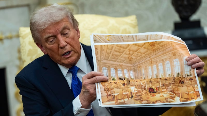 Trump shows off mock-up photos of his planned $300 million ballroom.
