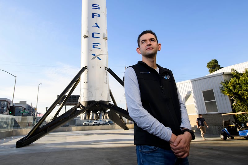 Jared Isaacman stands for a portrait in front of the recovered first stage of a Falcon 9 rocket at Space Exploration Technologies Corp. (SpaceX) on February 2, 2021 in Hawthorne, California. -
