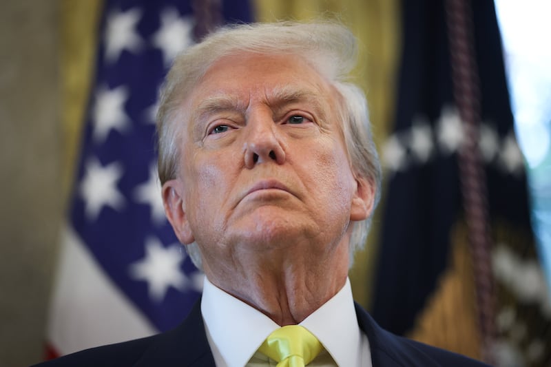 WASHINGTON, DC - AUGUST 07: U.S. President Donald Trump listens to questions from reporters after speaking on economic data  in the Oval Office on August 07, 2025 in Washington, DC. Trump fired Bureau of Labor Statistics Commissioner Dr. Erika McEntarfer on August 1st, claiming the agency issued “phony” jobs numbers during the Biden administration to aid Democrats.  (Photo by Win McNamee/Getty Images)
