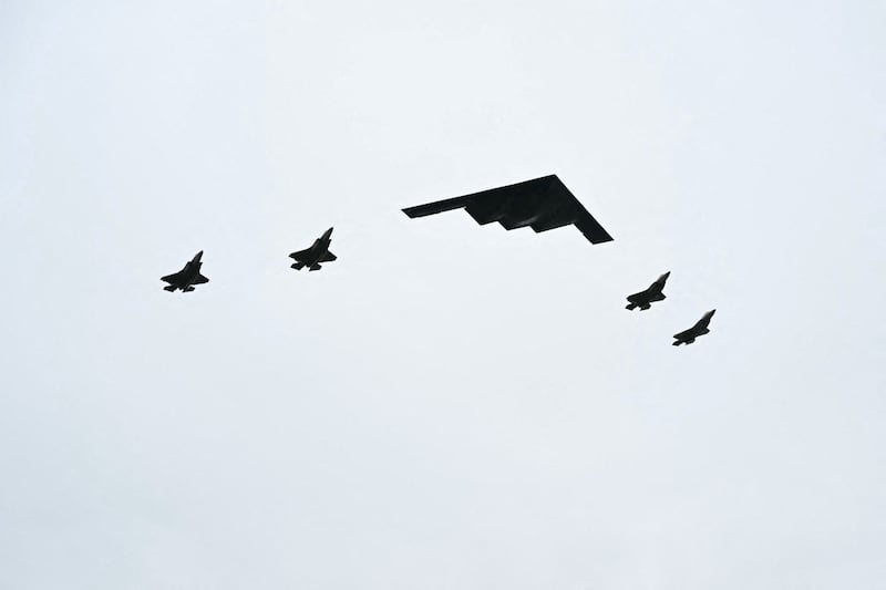 A B-2 bomber and four F-35 fighter jets flew overhead as President Donald Trump greeted Russian President Vladimir Putin.